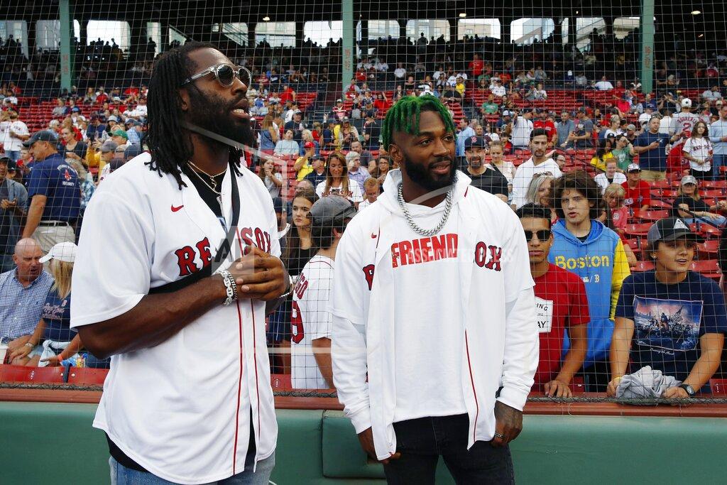 Michael Dwyer New England Patriots linebacker Matthew Judon, left, and cornerback Jalen Mills stand on the field before a baseball game between the Boston Red Sox and the New York Yankees, Saturday, Aug. 13, 2022, in Boston. (AP Photo/Michael Dwyer)