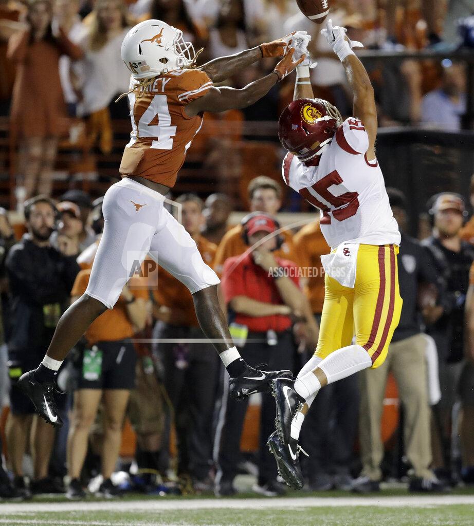 Eric Gay FILE - In this Sept. 15, 2018 file photo, Southern California safety Talanoa Hufanga (15) breaks up a pass intended for Texas Longhorns wide receiver Lil'Jordan Humphrey (84) during the first half of an NCAA college football game in Austin, Texas. XXXX (AP Photo/Eric Gay, File)