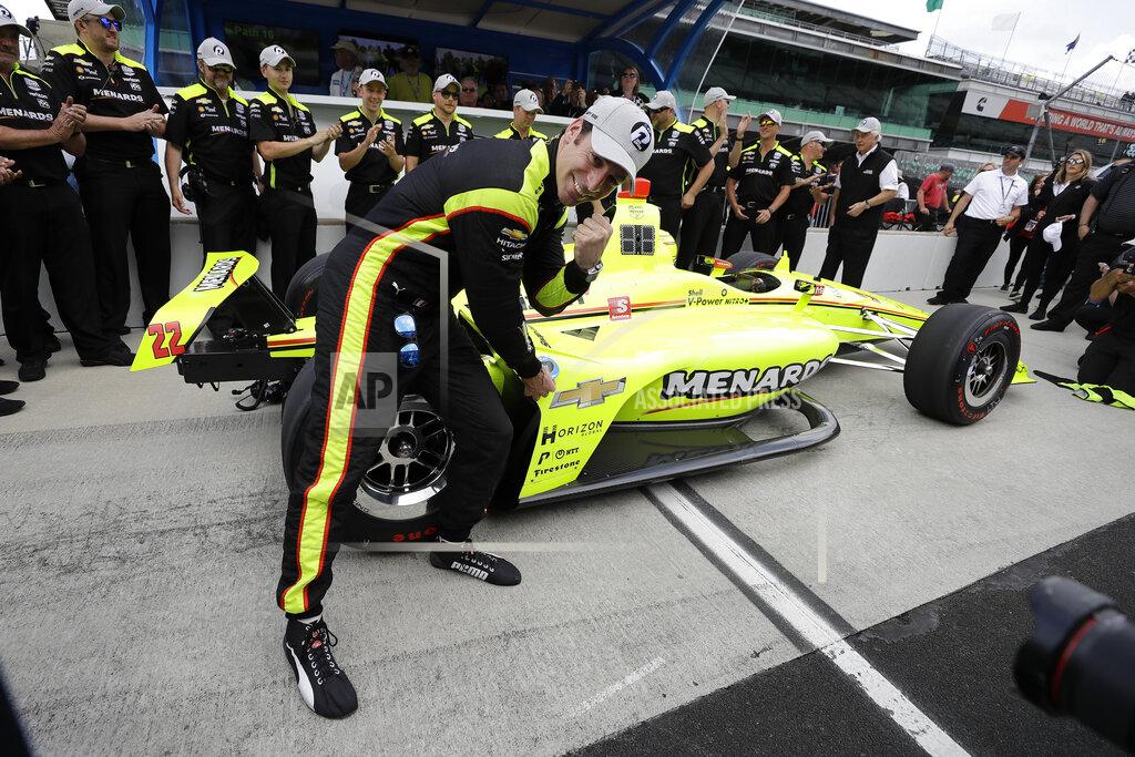 Darron Cummings Simon Pagenaud, of France, celebrates after winning the pole for the Indianapolis 500 IndyCar auto race at Indianapolis Motor Speedway, Sunday, May 19, 2019 in Indianapolis. (AP Photo/Darron Cummings)