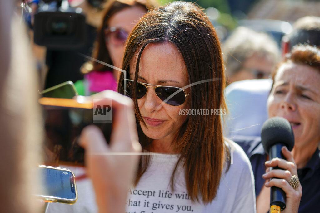 Luca Bruno Debora Campagnaro, sister of victim Erica Campagnaro, talks to journalists in Canazei, in the Italian Alps in northern Italy, Tuesday, July 5, 2022, where a glacier broke loose on Sunday, sending an avalanche of tons of ice, snow, and rocks onto hikers. (AP Photo/Luca Bruno)