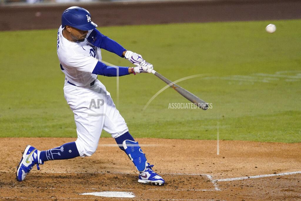 Ashley Landis Los Angeles Dodgers' Mookie Betts flies out to right field during the third inning of the team's baseball game against the Los Angeles Angels on Friday, Sept. 25, 2020, in Los Angeles. (AP Photo/Ashley Landis)