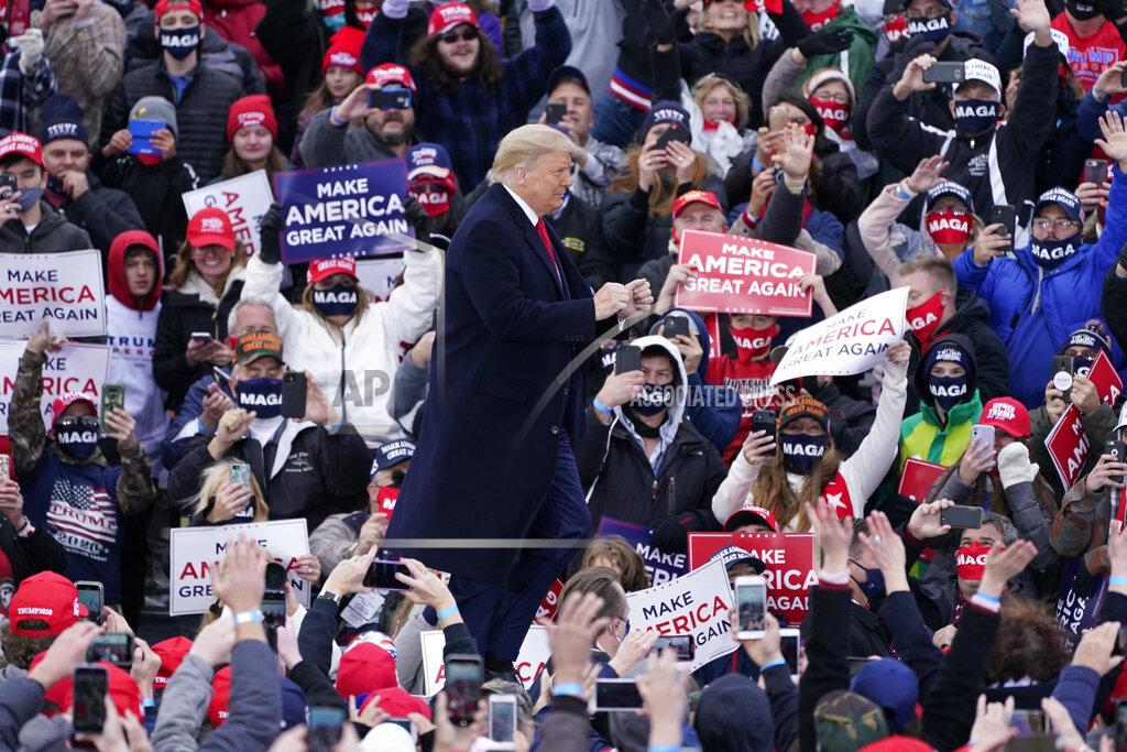 Carlos Osorio President Donald Trump arrives at a campaign rally, Saturday, Oct. 17, 2020, in Norton Shores, Mich. (AP Photo/Carlos Osorio)