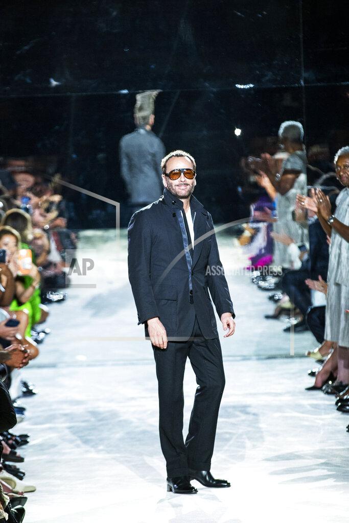Eduardo Munoz Alvarez Designer Tom Ford walks the runway at the end of his spring/summer 2022 fashion show at Lincoln Center during New York Fashion Week on Sunday, Sept. 12, 2021. (AP Photo/Eduardo Munoz Alvarez)