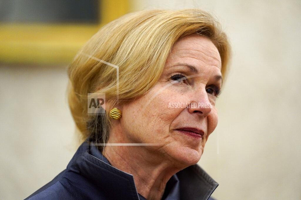 White House coronavirus response coordinator Dr. Deborah Birx listens as President Donald Trump holds a meeting about the coronavirus response with Gov. Greg Abbott, R-Texas, in the Oval Office of the White House, Thursday, May 7, 2020, in Washington. (AP Photo/Evan Vucci)