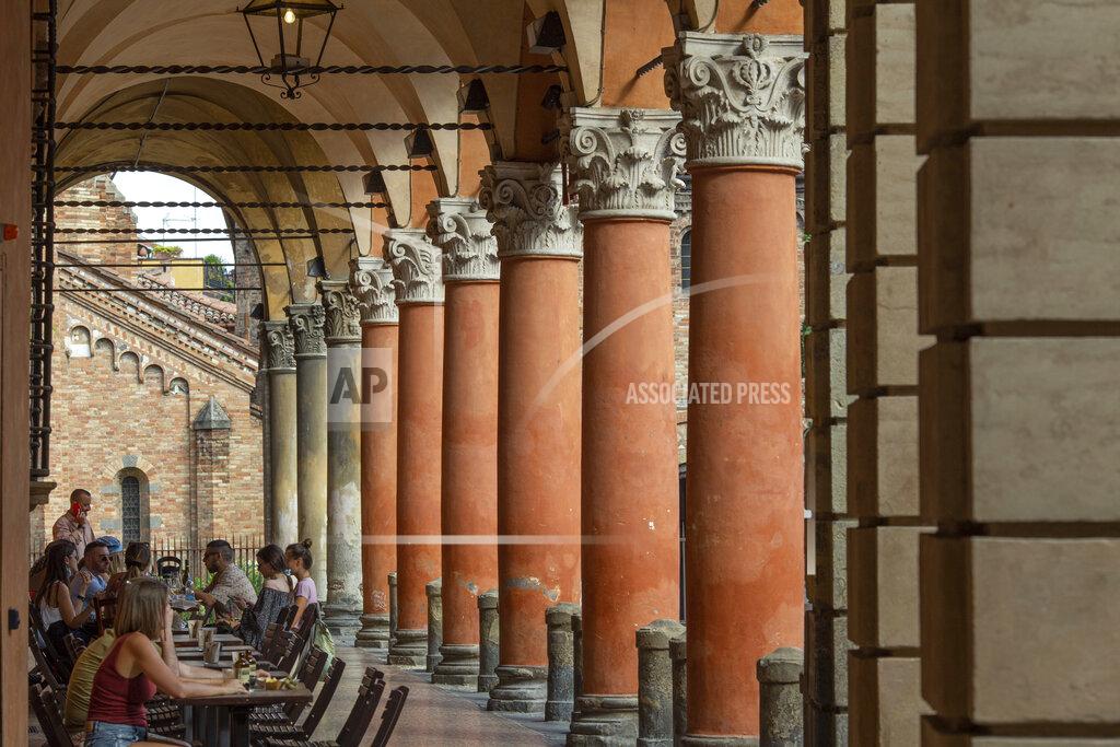 Guido Calamosca A view of Bologna's porticoes in Bologna, Italy, Wednesday, July 28, 2021. Bologna's 12th-century porticoes, still part of the city's everyday life, have been added to the World Heritage List. At a meeting in China on Wednesday, the World Heritage Committee of UNESCO, the U.N. culture agency, inscribed the porticoes on the prestigious list. The addition raises to 58 the number of Italian sites on the list. (Guido Calamosca/LaPresse via AP)