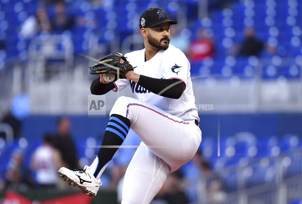 Jim Rassol Miami Marlins pitcher Pablo Lopez winds up during the first inning of the team's baseball game against the Milwaukee Brewers, Friday, May 13, 2022, in Miami. (AP Photo/Jim Rassol)