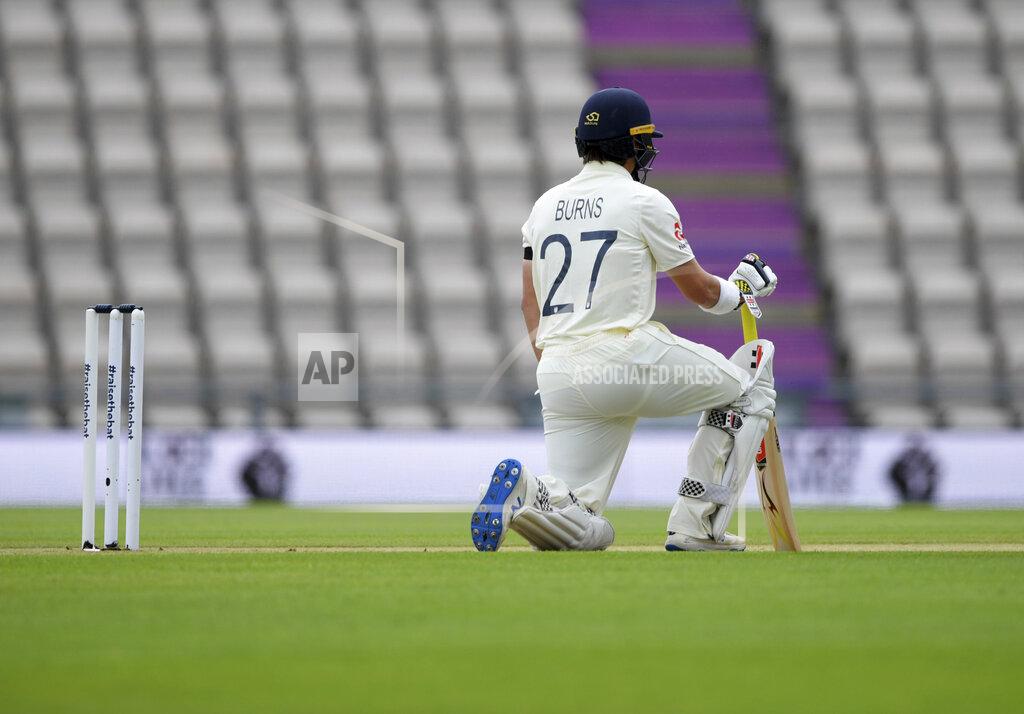 Mike Hewitt England's Rory Burns takes a knee on the first day of the 1st cricket Test match between England and West Indies, at the Ageas Bowl in Southampton, England, Wednesday July 8, 2020. (Mike Hewitt/Pool via AP)
