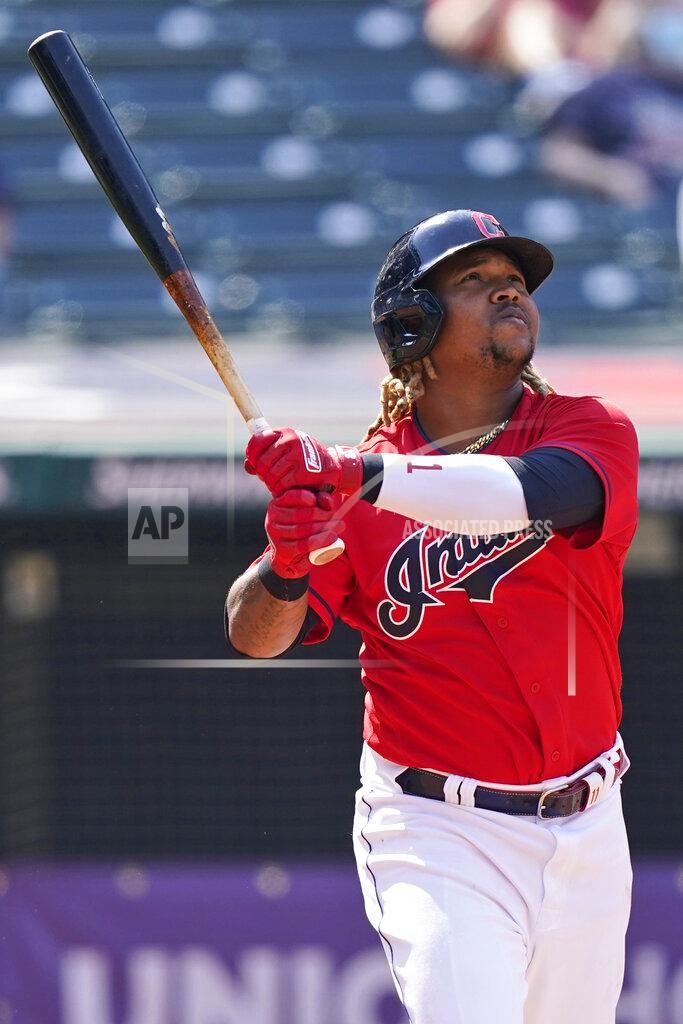 Tony Dejak Cleveland Indians' Jose Ramirez watches his ball after hitting a two-run home run in the sixth inning of a baseball game against the Kansas City Royals, Wednesday, April 7, 2021, in Cleveland. (AP Photo/Tony Dejak)