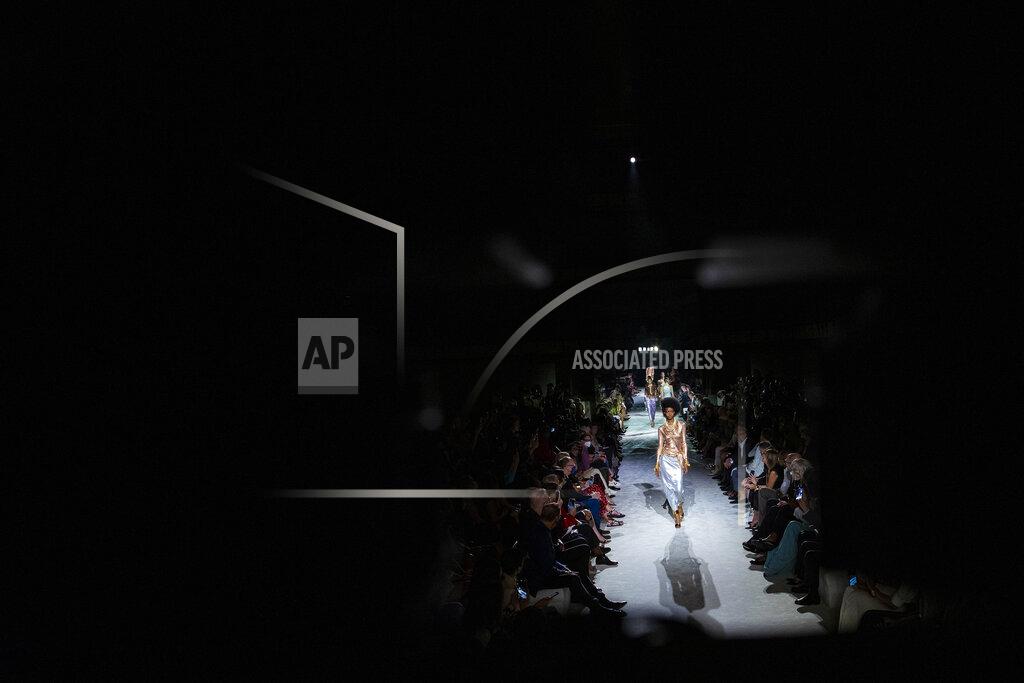 Eduardo Munoz Alvarez Models walk the runway at the Tom Ford spring/summer 2022 fashion show in the Lincoln Center during New York Fashion Week on Sunday, Sept. 12, 2021. (AP Photo/Eduardo Munoz Alvarez)