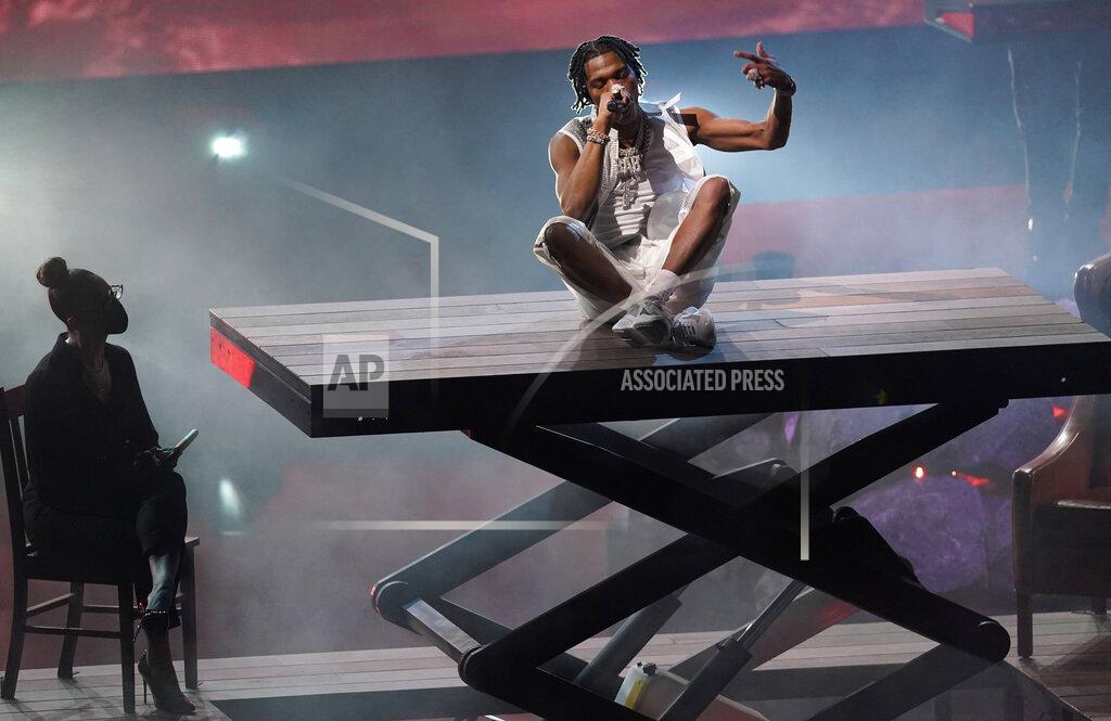 Chris Pizzello Lil Baby performs "Emotionally Scarred" at the American Music Awards on Sunday, Nov. 22, 2020, at the Microsoft Theater in Los Angeles. (AP Photo/Chris Pizzello)