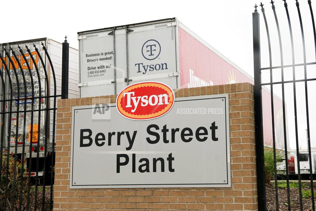Abby Zimmardi In this image from the Howard Center for Investigative Journalism at the University of Maryland's Philip Merrill College of Journalism, a Tyson Berry Street Plant sign is seen in front of the Springdale, Arkansas, Tyson parking lot for hauling chicken products, April 20, 2021. The Berry Street location had more than 400 COVID-19 cases among the workers, the highest number of cases across Arkansas poultry plants. (Abby Zimmardi/University of Arkansas via AP)