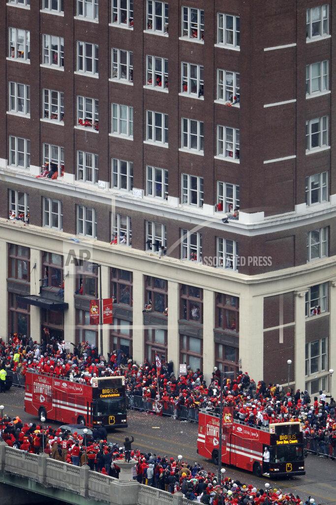 Charlie Riedel Busses carrying members of the Kansas City Chiefs travel in a parade through downtown Kansas City, Mo., Wednesday, Feb. 5, 2020m to celebrate the Chiefs victory in the NFL's Super Bowl 54. (AP Photo/Charlie Riedel)