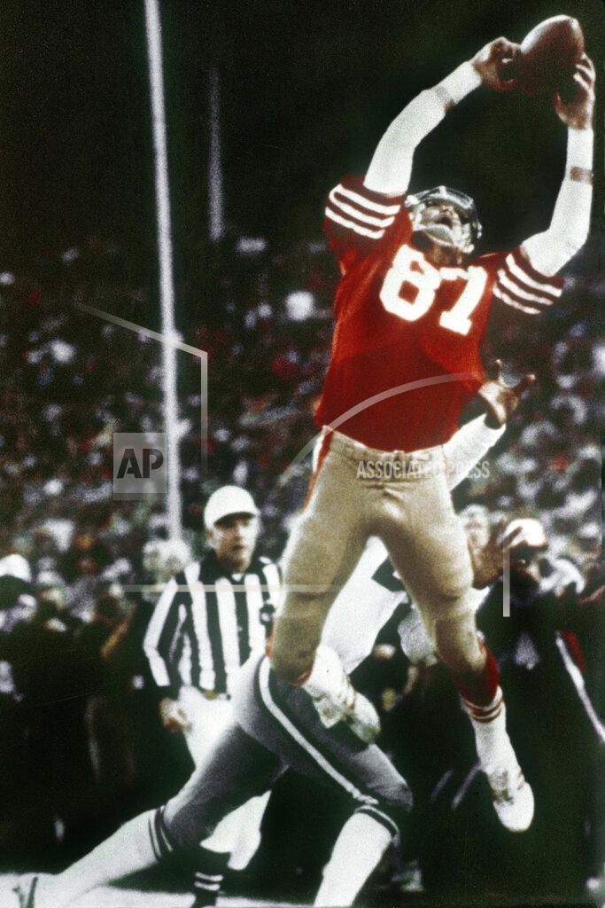 Phil Huber FILE - In this Jan. 10, 1982, file photo, San Francisco 49ers wide receiver Dwight Clark makes "The Catch," a pass from Joe Montana that tied the game late in the fourth quarter against the Dallas Cowboys in the NFC championship football game at Candlestick Park in San Francisco. (Phil Huber/The Dallas Morning News via AP, File)