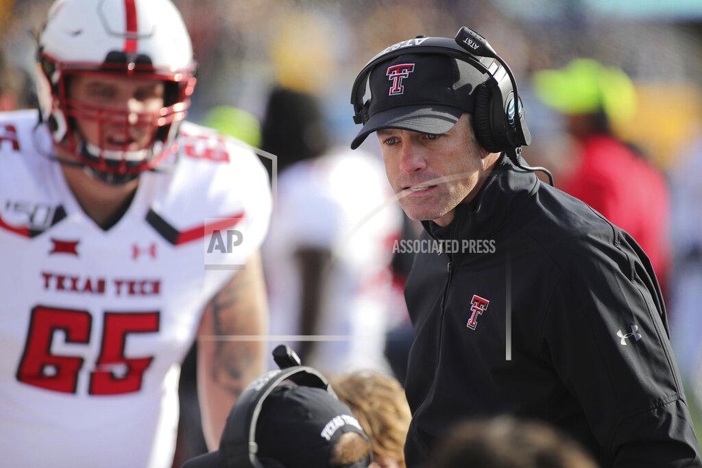 Chris Jackson Texas Tech head coach Matt Wells speaks to his team during the third quarter of their NCAA college football game against West Virginia in Morgantown, W.Va., Saturday, Nov. 9, 2019. (AP Photo/Chris Jackson)