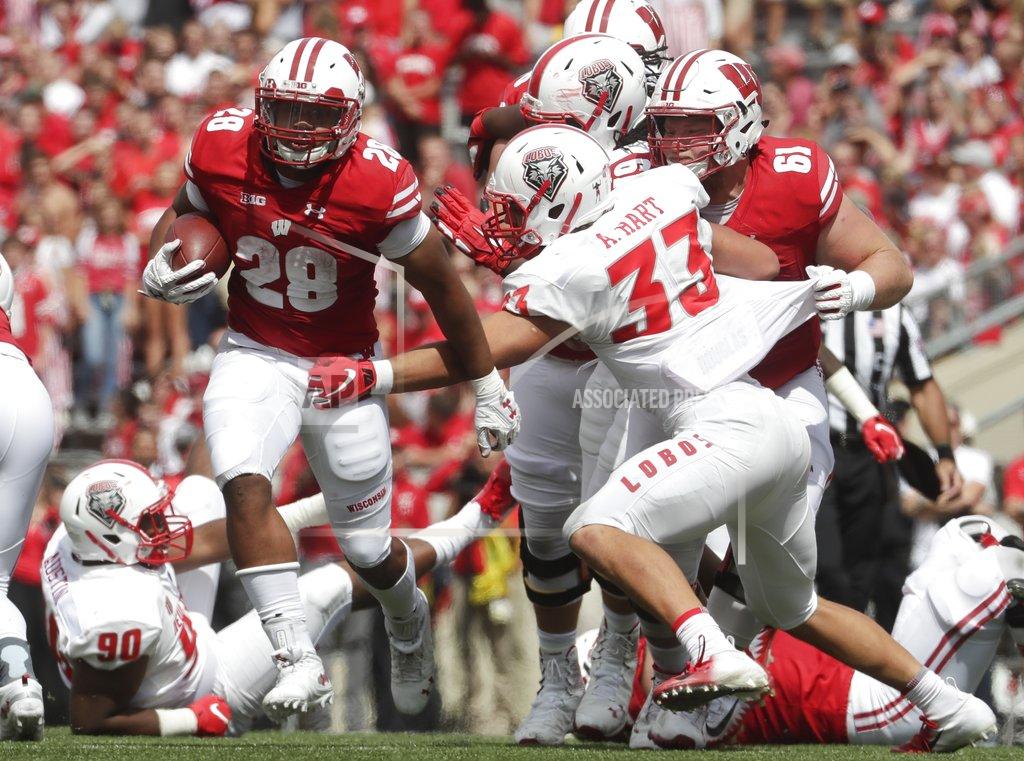 Morry Gash Wisconsin's Taiwan Deal runs during the second half of an NCAA college football game against New Mexico Saturday, Sept. 8, 2018, in Madison, Wis. Wisconsin won 45-14. (AP Photo/Morry Gash)
