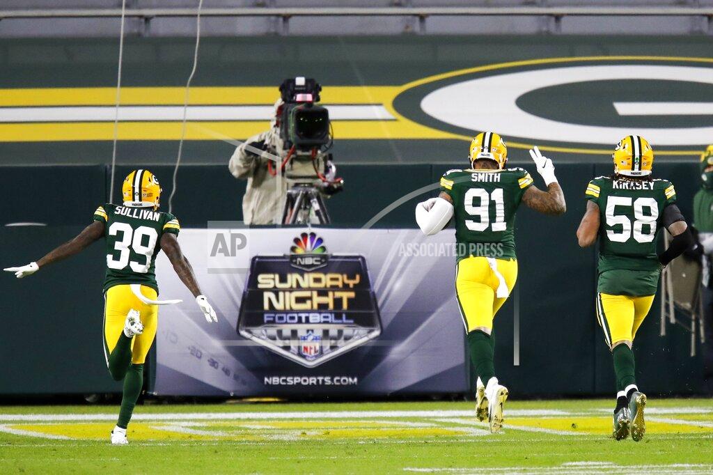 Matt Ludtke Green Bay Packers' Preston Smith runs for a touchdown after recovering a fumble during the first half of an NFL football game against the Chicago Bears Sunday, Nov. 29, 2020, in Green Bay, Wis. (AP Photo/Matt Ludtke)