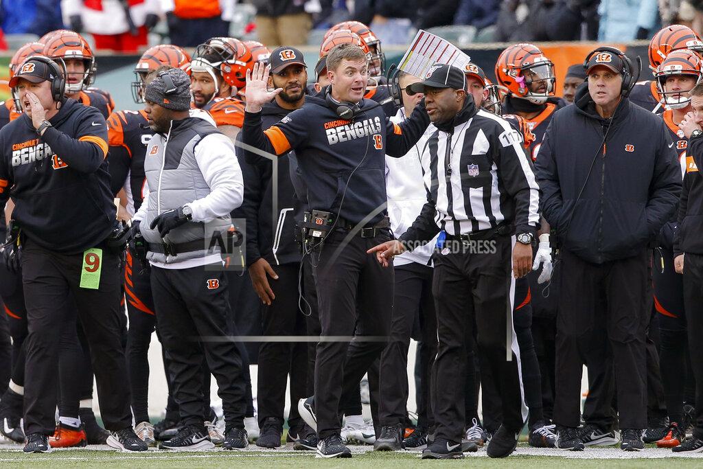 Gary Landers Cincinnati Bengals head coach Zac Taylor, center, reacts to a play call resulting in a New England Patriots fumble recovery off wide receiver Alex Erickson in the first half of an NFL football game, Sunday, Dec. 15, 2019, in Cincinnati. (AP Photo/Gary Landers)