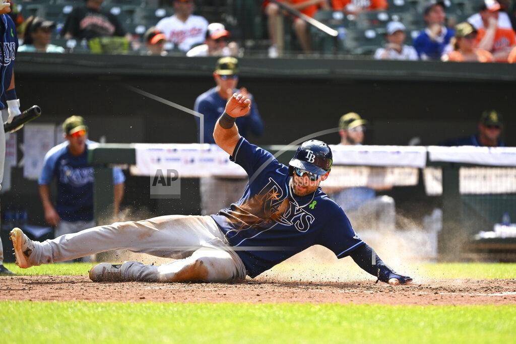 Terrance Williams Tampa Bay Rays' Kevin Kiermaier scores a run on single hit by Rays' Randy Arozarena against Baltimore Orioles relief pitcher Dillon Tate during the seventh inning of a baseball game, Sunday, May 22, 2022, in Baltimore. (AP Photo/Terrance Williams)