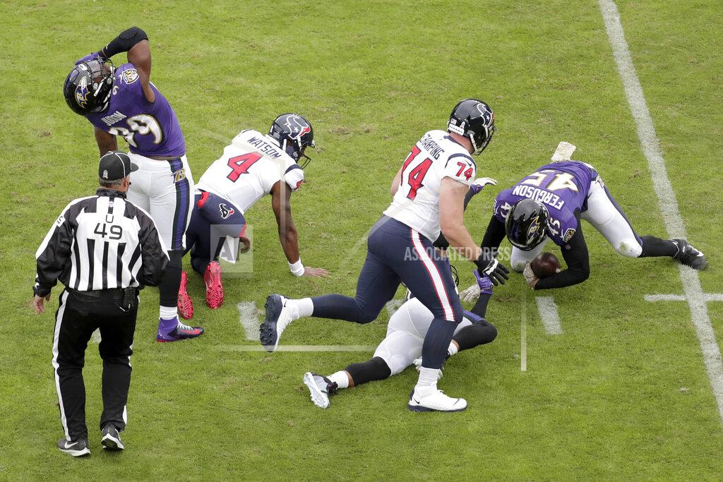 Julio Cortez Baltimore Ravens linebacker Jaylon Ferguson (45) collects a fumble by Houston Texans quarterback Deshaun Watson (4) on a sack by Ravens outside linebacker Matt Judon (99) during the first half of an NFL football game, Sunday, Nov. 17, 2019, in Baltimore. (AP Photo/Julio Cortez)