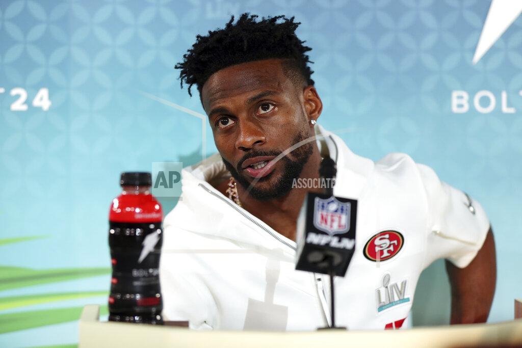 Steve Luciano FILE - Then-San Francisco 49ers wide receiver Emmanuel Sanders speaks to the media during Opening Night for the NFL Super Bowl 54 football game in Miami, in this Monday, Jan. 27, 2020, file photo. New Orleans Saints first-year receiver Emmanuel Sanders is trying to reach his fourth Super Bowl with a fourth different team. (AP Photo/Steve Luciano, File)