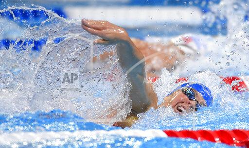 FILE - In this June 28, 2016 file photo, Elizabeth Beisel competes in the women's 200-meter freestyle preliminaries at the U.S. Olympic swimming trials in Omaha, Neb. Beisel competed in three Olympics, but she's never taken on a challenge quite like this. Honoring her late father and raising money for cancer research, she's planning to swim more than 12 miles through cold ocean waters to a popular vacation island off the Rhode Island coast. (AP Photo/Mark J. Terrill, File)