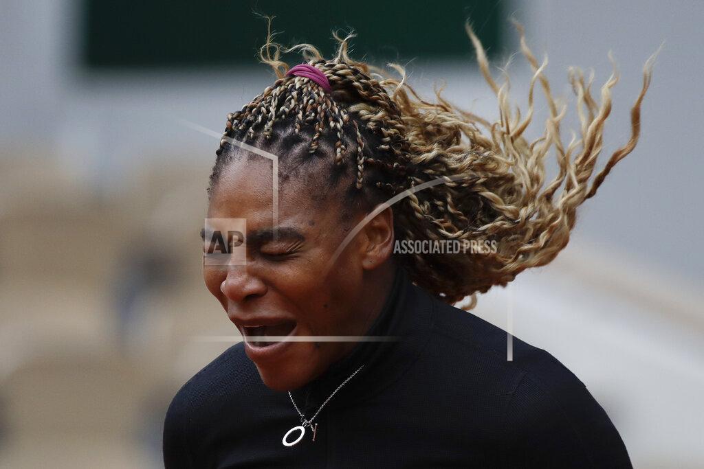 Alessandra Tarantino Serena Williams of the U.S. screams in the first round match of the French Open tennis tournament against Kristie Ahn of the U.S. at the Roland Garros stadium in Paris, France, Monday, Sept. 28, 2020. (AP Photo/Alessandra Tarantino)