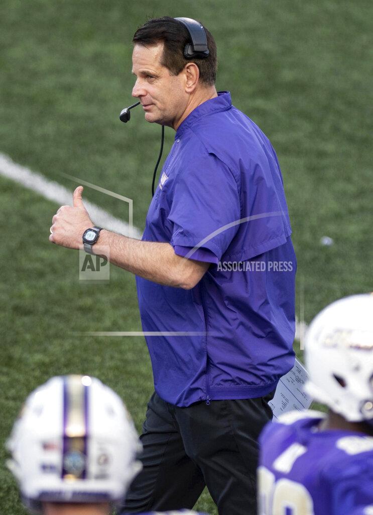 Daniel Lin James Madison head coach Curt Cignetti gives a thumbs-up during the first half of a quarterfinal game against North Dakota in the NCAA FCS football playoffs in Harrisonburg, Va., Sunday, May 2, 2021. (Daniel Lin/Daily News-Record via AP)