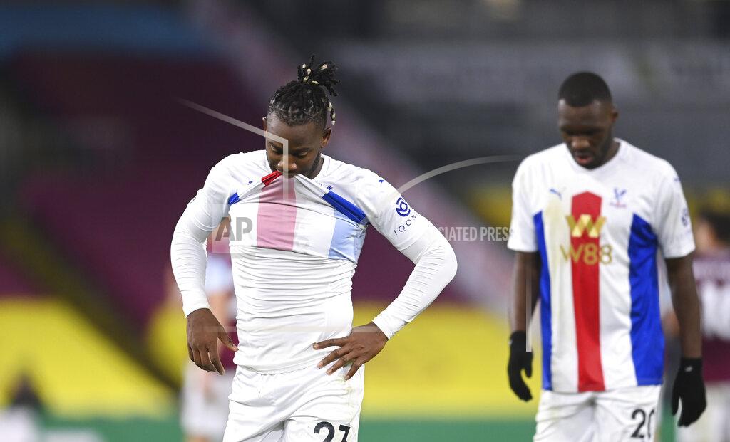 Michael Regan Crystal Palace's Michy Batshuayi, left, and Crystal Palace's Christian Benteke leave the field after the English Premier League soccer match between Burnley and Crystal Palace at the Turf Moor stadium in Burnley, England, Monday, Nov. 23, 2020. (Michael Regan/Pool via AP)