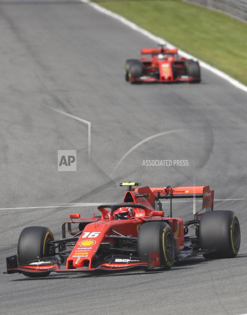 Luca Bruno Ferrari driver Charles Leclerc of Monaco leads Ferrari driver Sebastian Vettel of Germany during the qualifying session at the Monza racetrack, in Monza, Italy, Saturday, Sept. 7, 2019. The Formula one race will be held on Sunday. (AP Photo/Luca Bruno)