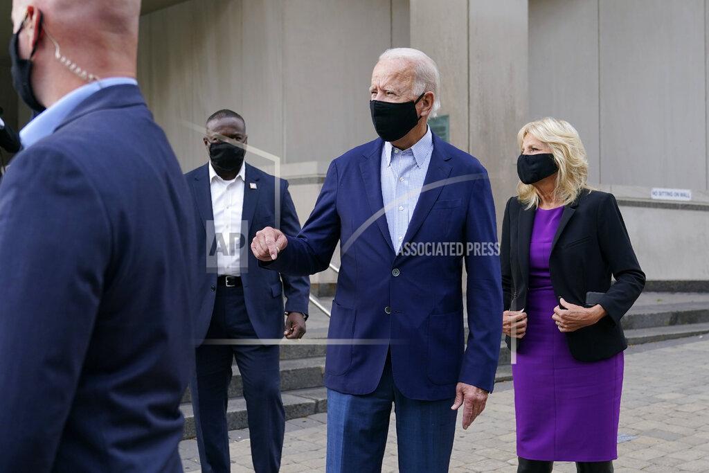 Patrick Semansky Democratic presidential candidate and former Vice President Joe Biden speaks with reporters as he and his wife Jill Biden depart after voting early in Delaware's state primary election at the New Castle County Board of Elections office in Wilmington, Del., Monday, Sept. 14, 2020. (AP Photo/Patrick Semansky)
