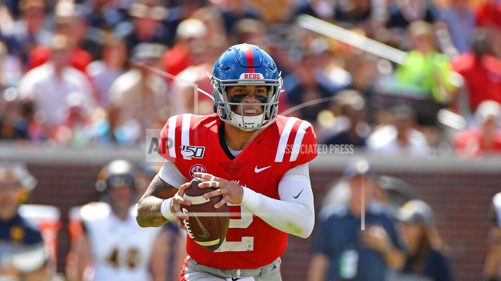 Mississippi quarterback Matt Corral (2) looks to pass during the first half of an NCAA college football game against California in Oxford, Miss., Saturday, Sept. 21, 2019. (AP Photo/Thomas Graning)