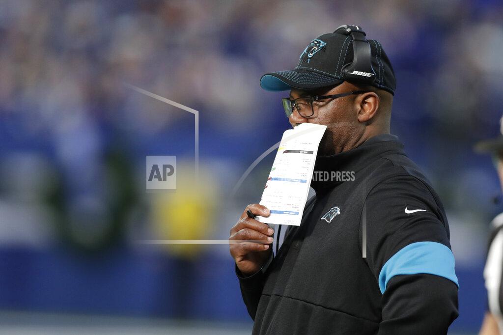 Michael Conroy Carolina Panthers interim head coach Perry Fewel watches the first half of an NFL football game against the Indianapolis Colts, Sunday, Dec. 22, 2019, in Indianapolis. (AP Photo/Michael Conroy)