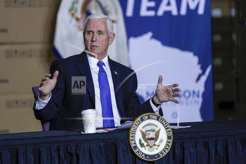 Morry Gash Vice President Mike Pence visits the GE Healthcare manufacturing facility Tuesday, April 21, 2020, in Madison, Wis. (AP Photo/Morry Gash)