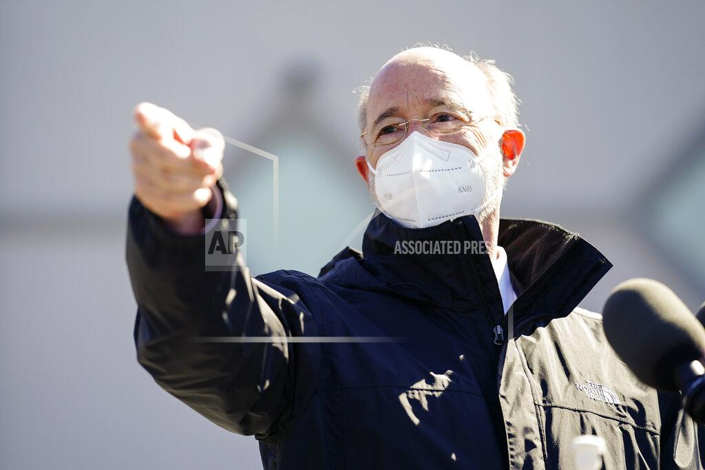 Pennsylvania, Gov. Tom Wolf speaks outside a Rite-Aid pharmacy in Steelton, Pa., that is administering COVID-19 vaccinations, Friday, March 5, 2021. (AP Photo/Matt Rourke)