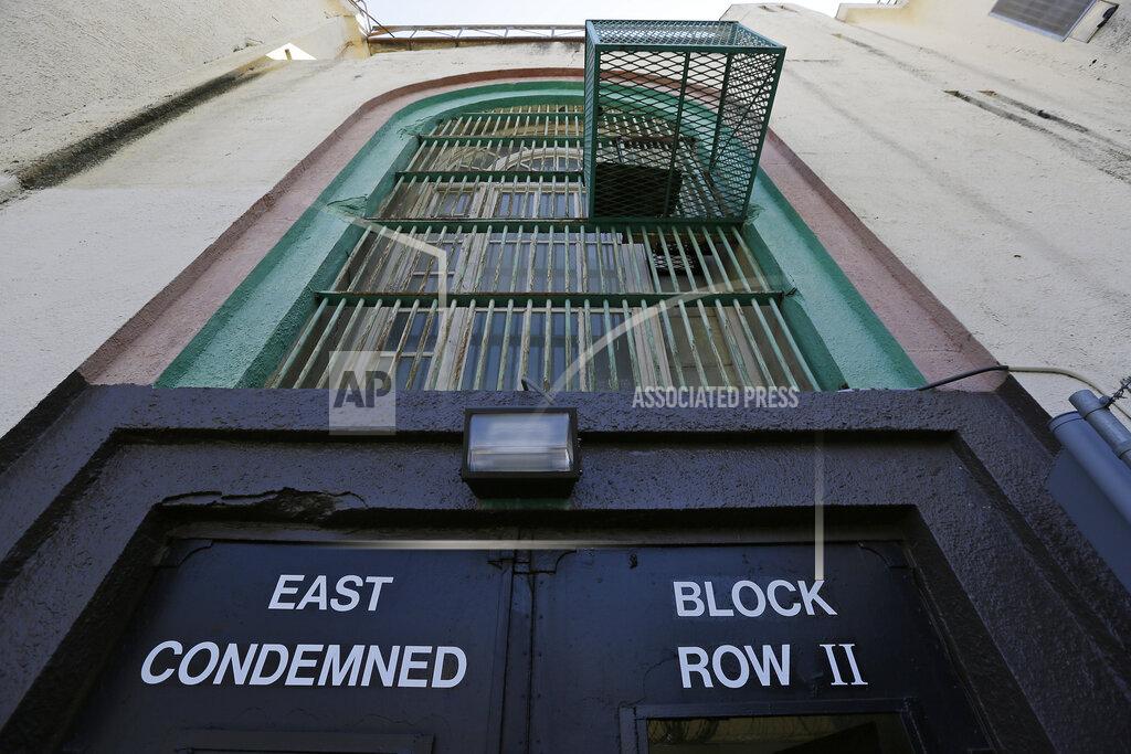 Eric Risberg Shown is the entrance to the east block of death row at San Quentin State Prison Tuesday, Aug. 16, 2016, in San Quentin, Calif. The California Labor and Workforce Development Agency confirmed Tuesday, Dec. 1, 2020, that California has sent about $400 million in unemployment benefits to state prison inmates. In all records show 31,000 inmates have applied for benefits and about 20,800 were paid $400 million. A group of local and federal prosecutors said 133 inmates on death row were named in claims. (AP Photo/Eric Risberg, File)