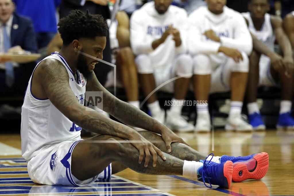 Adam Hunger Seton Hall guard Myles Powell (13) reacts after falling to the court during the second half of an NCAA college basketball game against Michigan State on Thursday, Nov. 14, 2019, in Newark, N.J. (AP Photo/Adam Hunger)