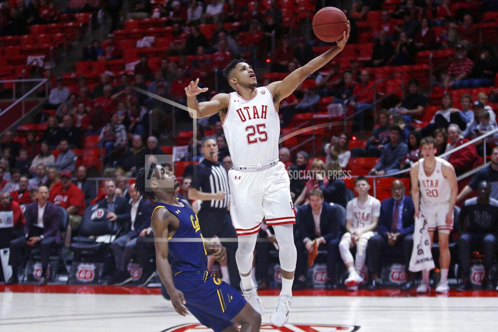 Rick Bowmer Utah guard Alfonso Plummer (25) lays the ball up as California guard Joel Brown defends during the second half of an NCAA college basketball game Saturday, Feb. 8, 2020, in Salt Lake City. (AP Photo/Rick Bowmer)