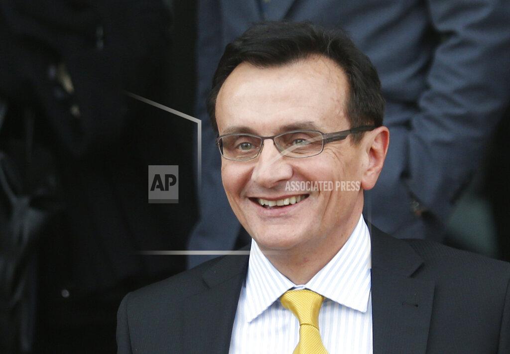 FILE - In this Tuesday, May 13, 2014 file photo, AstraZeneca CEO Pascal Soriot leaves the British Parliament's Business Innovation and Skills Committee after a hearing in central London. Two firms developing COVID-19 vaccines say pharmaceutical companies are trying to give the public as much information as possible about their testing regimes as drugmakers and public health officials seek to boost confidence that any approved vaccine will be safe. AstraZeneca CEO Pascal Soriot and Paul Stoffels, chief scientific officer of Johnson & Johnson, said Thursday Sept. 24, 2020, that they recognize the coronavirus emergency demands increased transparency from vaccine developers to ensure the public has faith in the end product. (AP Photo/Lefteris Pitarakis, File)