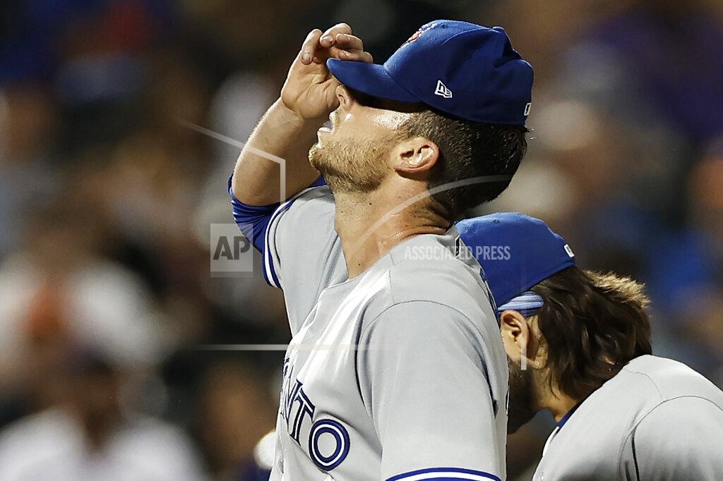 Adam Hunger Toronto Blue Jays pitcher Steven Matz reacts as he is taken out of the baseball game against the New York Mets during the sixth inning Friday, July 23, 2021, in New York. (AP Photo/Adam Hunger)