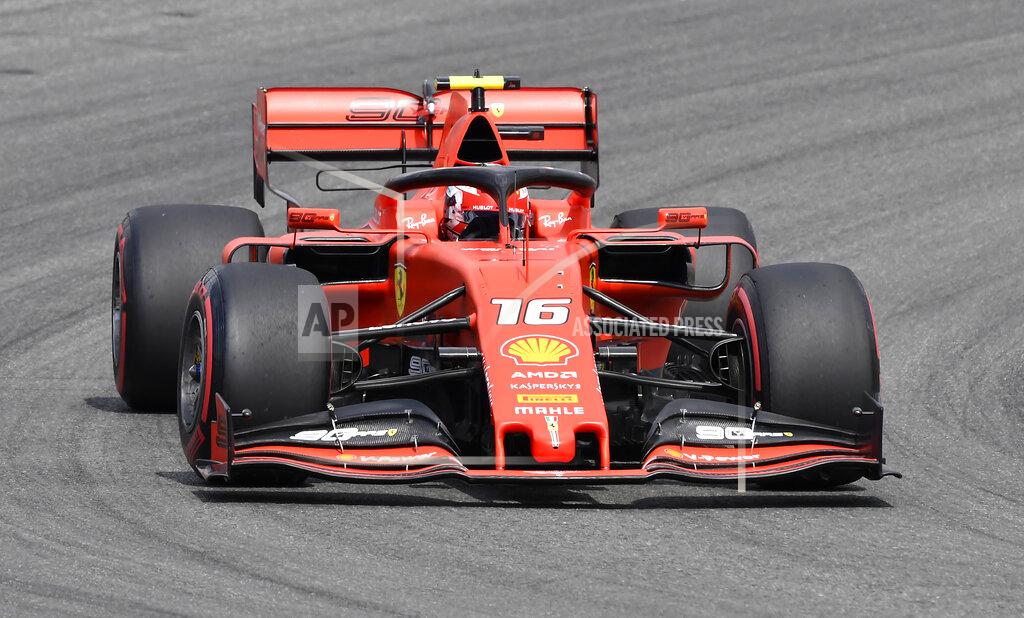 Jens Meyer Ferrari driver Charles Leclerc of Monaco steers his car during the qualifying Formula One session at the Hockenheimring racetrack in Hockenheim, Germany, Saturday, July 27, 2019. The German Formula One Grand Prix will be held on Sunday. (AP Photo/Jens Meyer)