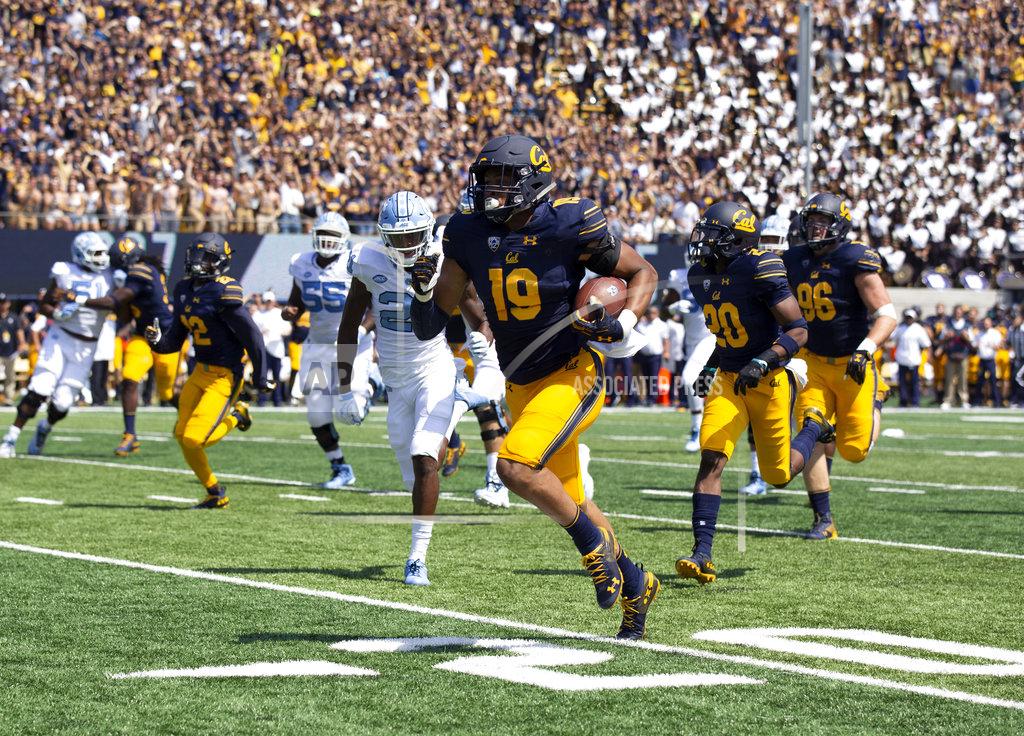 D. Ross Cameron California linebacker Cameron Goode (19) runs back an interception of a pass by North Carolina quarterback Nathan Elliott for a touchdown during the first half of an NCAA college football game, Saturday, Sept. 1, 2018, in Berkeley, Calif. (AP Photo/D. Ross Cameron)