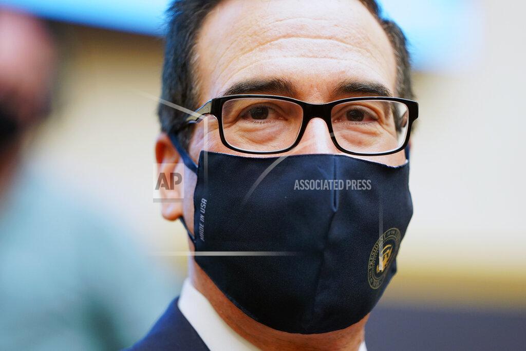 Joshua Roberts Treasury Secretary Steven Mnuchin wears a face mask as he arrives for a House Financial Services Committee hearing about the government’s emergency aid to the economy in response to the coronavirus on Capitol Hill in Washington on Tuesday, Sept. 22, 2020. (Joshua Roberts/Pool via AP)