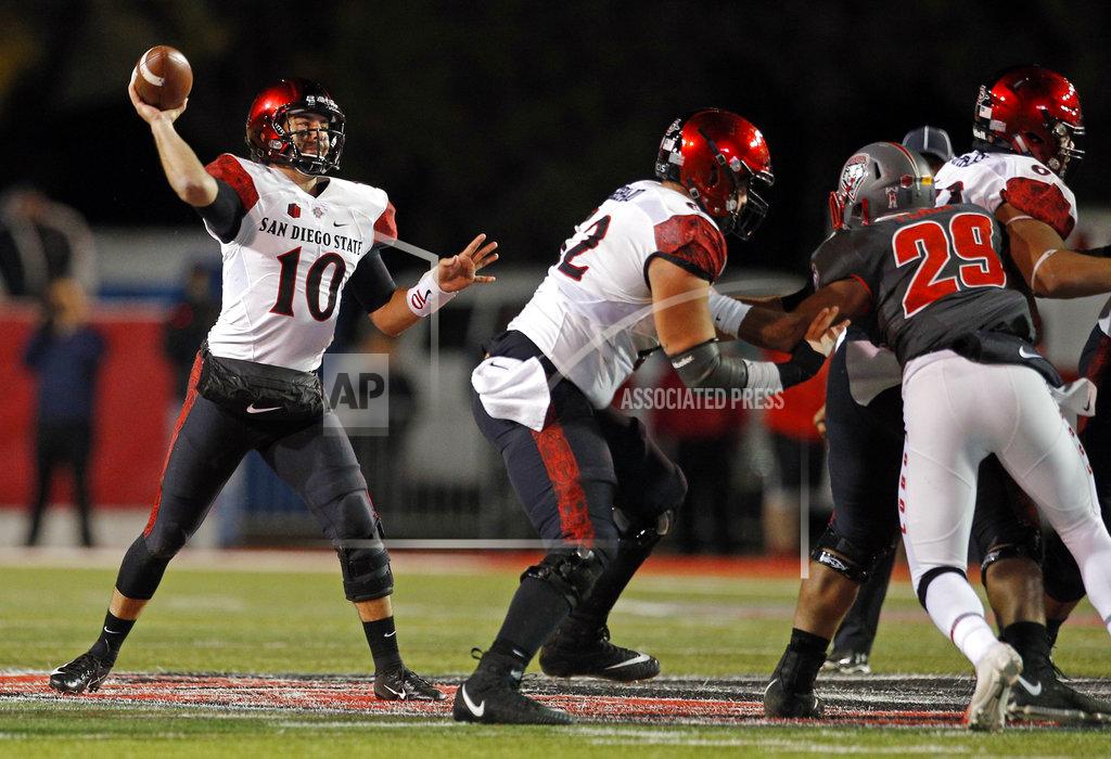 Andres Leighton San Diego State quarterback Christian Chapman (10) throws during the second half of an NCAA college football game against New Mexico in Albuquerque, N.M., Saturday, Nov. 3, 2018. San Diego State won 31-23. (AP Photo/Andres Leighton)
