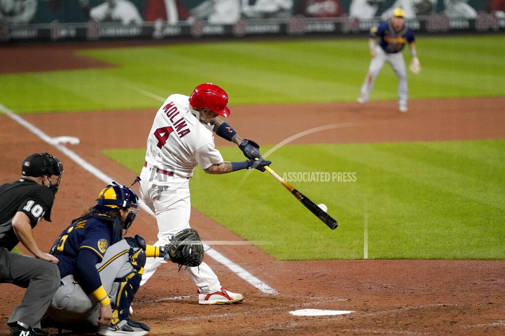 Jeff Roberson St. Louis Cardinals' Yadier Molina singles for his 2,000th career hit during the seventh inning of a baseball game against the Milwaukee Brewers Thursday, Sept. 24, 2020, in St. Louis. (AP Photo/Jeff Roberson)