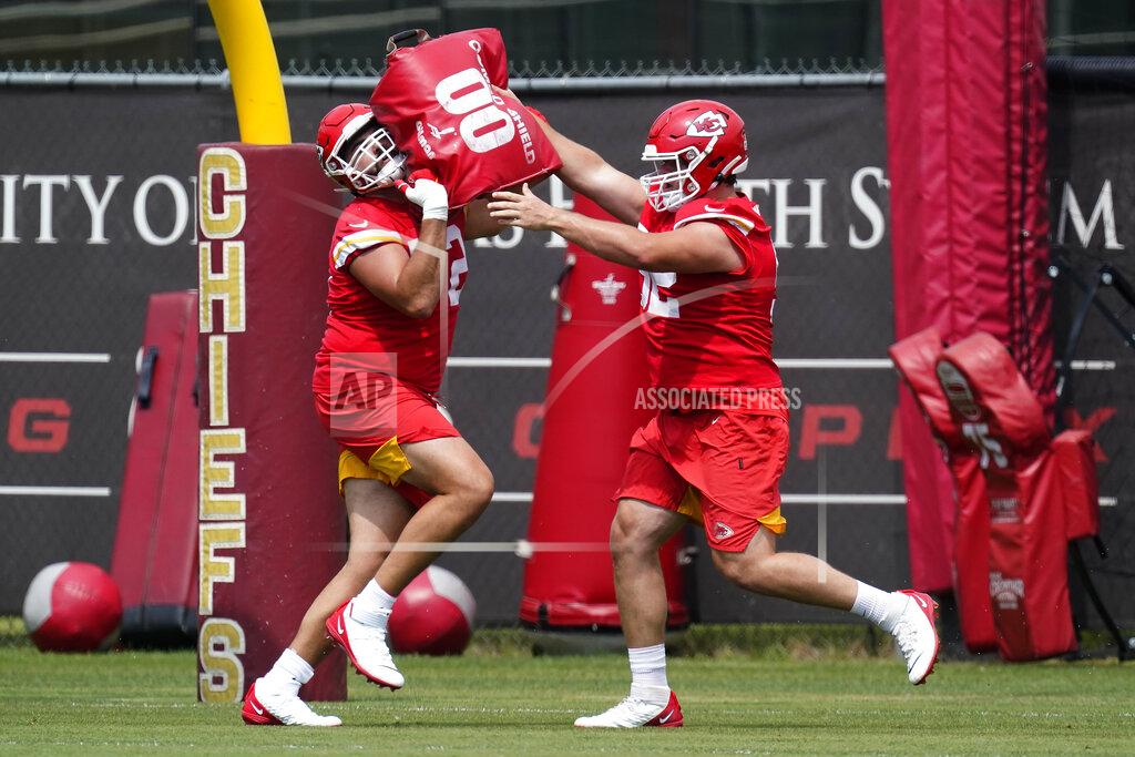 Charlie Riedel FILE - Kansas City Chiefs center Creed Humphrey, right, and offensive lineman Wyatt Miller, left, participate in a drill during the NFL football team's minicamp in Kansas City, Mo., in this Wednesday, June 16, 2021, file photo. With only a few practices remaining before breaking training camp, the Kansas City Chiefs take a business trip on Saturday to visit the San Francisco 49ers. For quarterback Patrick Mahomes, the results in this first preseason outing matter less than the process. “You always like a score, but at the end of the day, I think if the communication, the procedures of in and out of the huddle with so many new guys, especially on that offensive line, I think that would be a win for me just throughout this first game,” Mahomes said. (AP Photo/Charlie Riedel, File)