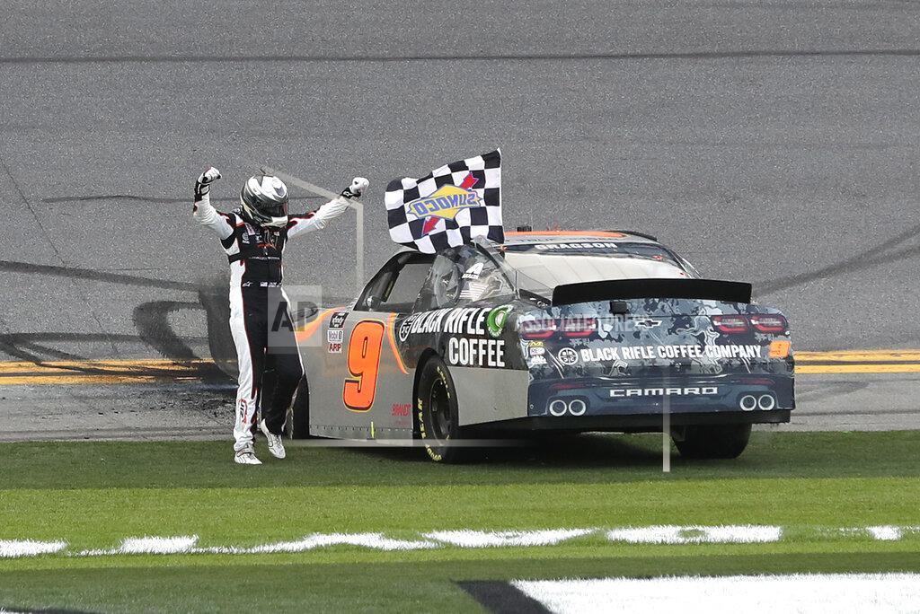 John Raoux Noah Gragson celebrates in front of fans after winning the NASCAR Xfinity series auto race at Daytona International Speedway, Saturday, Feb. 15, 2020, in Daytona Beach, Fla. (AP Photo/John Raoux)