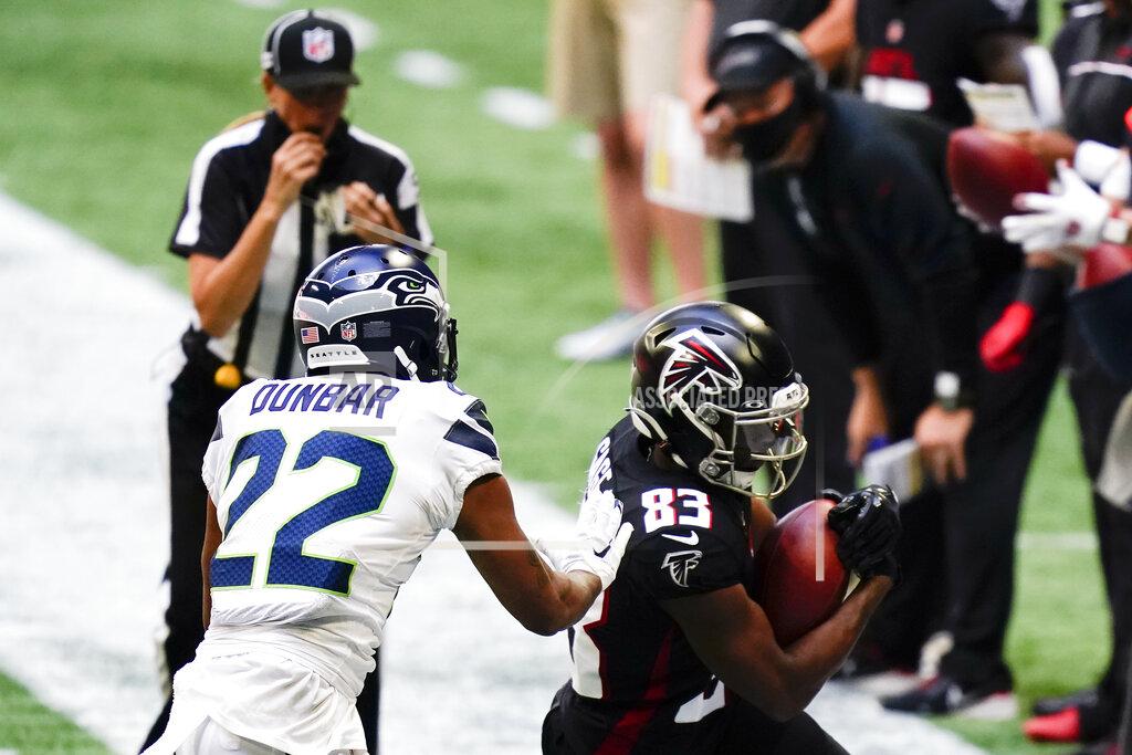 Brynn Anderson Atlanta Falcons wide receiver Russell Gage (83) makes the catch against Seattle Seahawks cornerback Quinton Dunbar (22) during the second half of an NFL football game, Sunday, Sept. 13, 2020, in Atlanta. (AP Photo/Brynn Anderson)