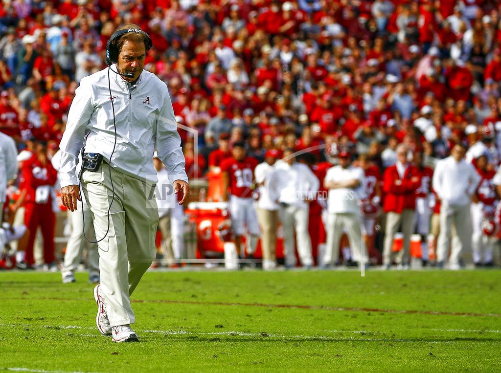 Butch Dill Alabama head coach Nick Saban walks across the field to check on running back Damien Harris (34) during the second half of an NCAA college football game against the Citadel, Saturday, Nov. 17, 2018, in Tuscaloosa, Ala. (AP Photo/Butch Dill)