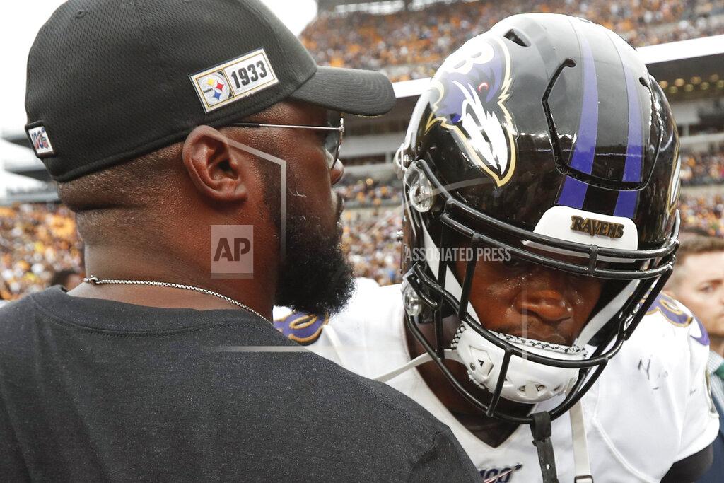 Don Wright Pittsburgh Steelers head coach Mike Tomlin, left, talks with Baltimore Ravens quarterback Lamar Jackson (8) after overtime of an NFL football game, Sunday, Oct. 6, 2019, in Pittsburgh. The Ravens won 26-23. (AP Photo/Don Wright)
