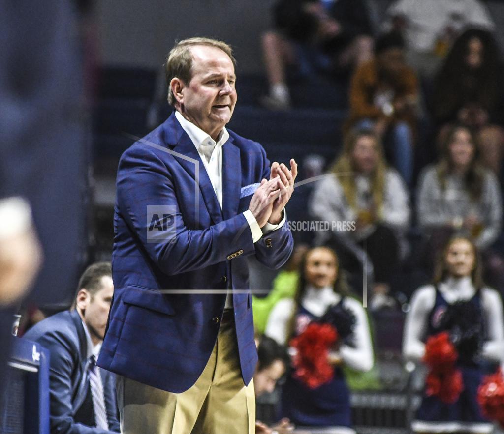Bruce Newman Mississippi coach Kermit Davis applauds during the team's NCAA college basketball game against Seattle on Tuesday, Nov. 19, 2019, in Oxford, Miss. (Bruce Newman/The Oxford Eagle via AP)